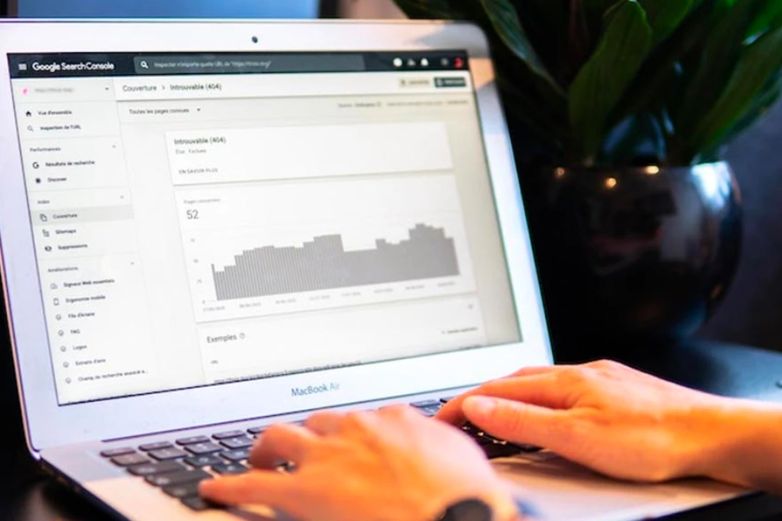 Laptop showing Google Search Console data, representing SEO performance tracking, search visibility, and technical insights.