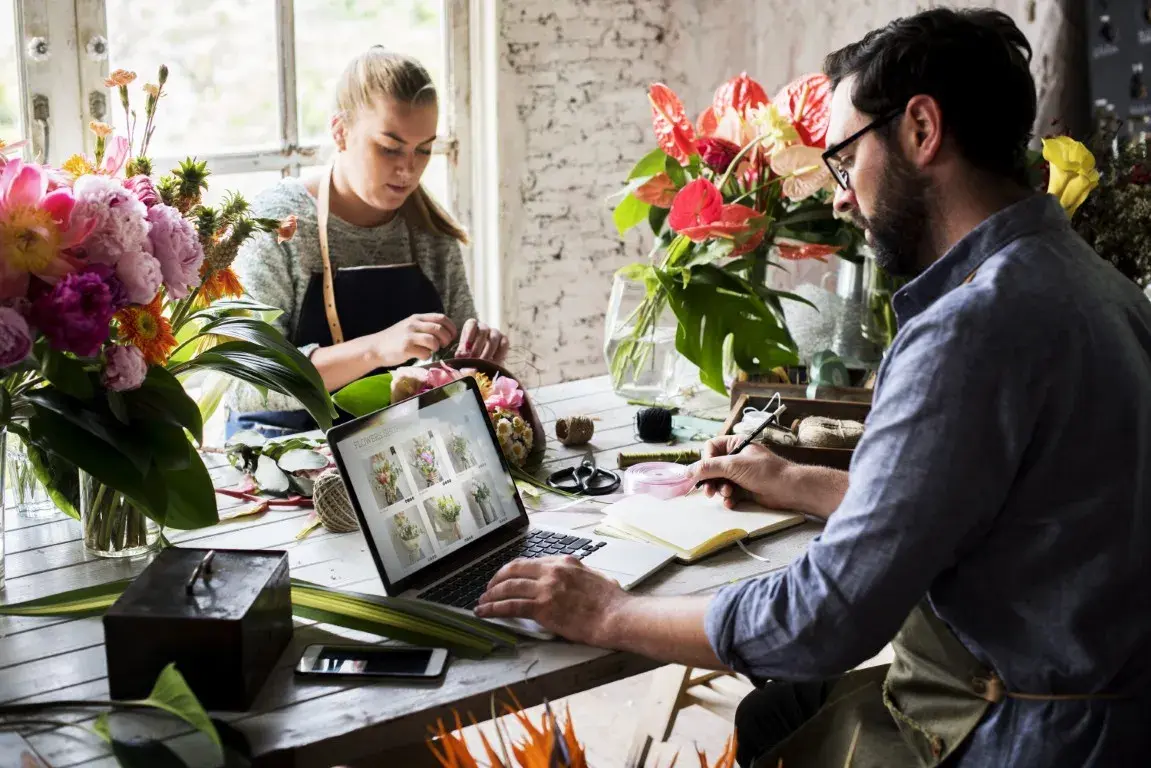 A local business website that's optimized for AI search shows on a laptop screen.
