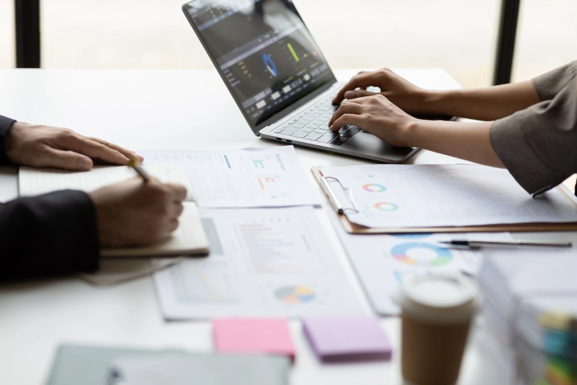 A business owner reviews a Google Ads lead generation report.